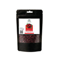 A black stand-up pouch of Hibiscus tea with a white label showing the brand 'Liberty Herbs' and a clear window displaying the dried hibiscus flowers inside.