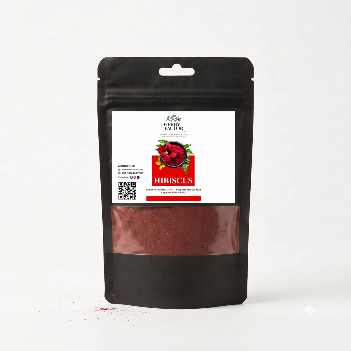 A black stand-up pouch of Hibiscus powder with a clear window showing the reddish-brown spice inside. The front label is white with a red and green hibiscus graphic and the brand name 'Hibiscus Organic'.