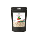 A black stand-up pouch of watermelon seeds with a clear window showing the beige seeds inside, on a plain white background.