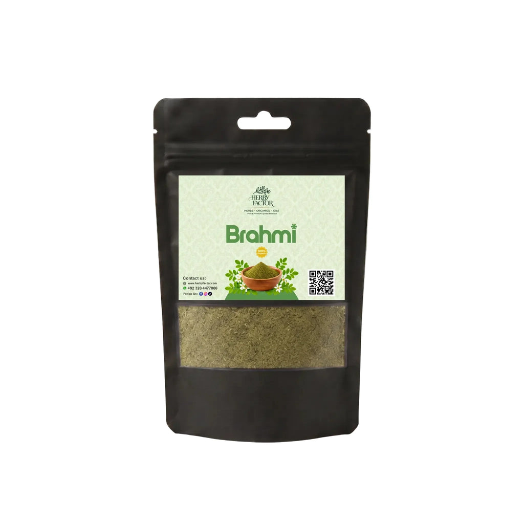 A black resealable stand-up pouch of Herby Factor Brahmi herbal powder with a light green front label and a clear window showing the green-brown powder inside, photographed on a plain white background.