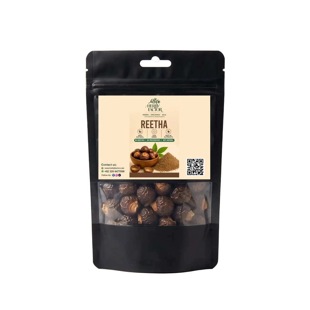 Black stand-up window pouch package displaying pure raw Reetha Soapnut Sapindus mukorossi by Herby Factor Pakistan