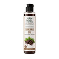 A 100ml bottle of Herby Factor Shikakai Oil, Acacia Concinna Roghan e Shikakai featuring a clear plastic bottle showing the dark brown oil inside, a black flip-top cap, and a white label with brown and green text and graphics.