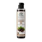 A 200ml bottle of Herby Factor Shikakai Oil, Acacia Concinna Roghan e Shikakai featuring a clear plastic bottle showing the dark brown oil inside, a black flip-top cap, and a white label with brown and green text and graphics.